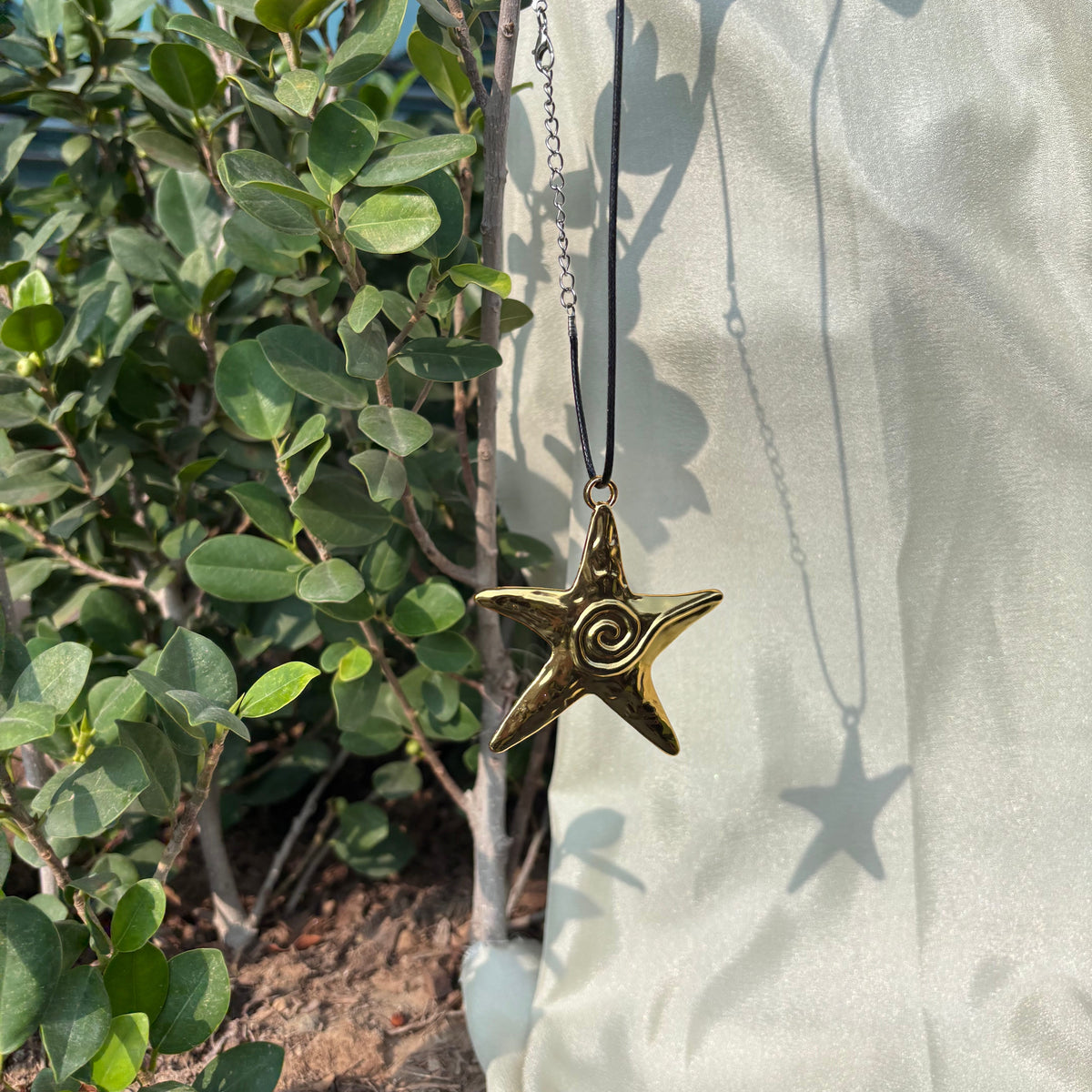 Gold Swrill Star Pendant